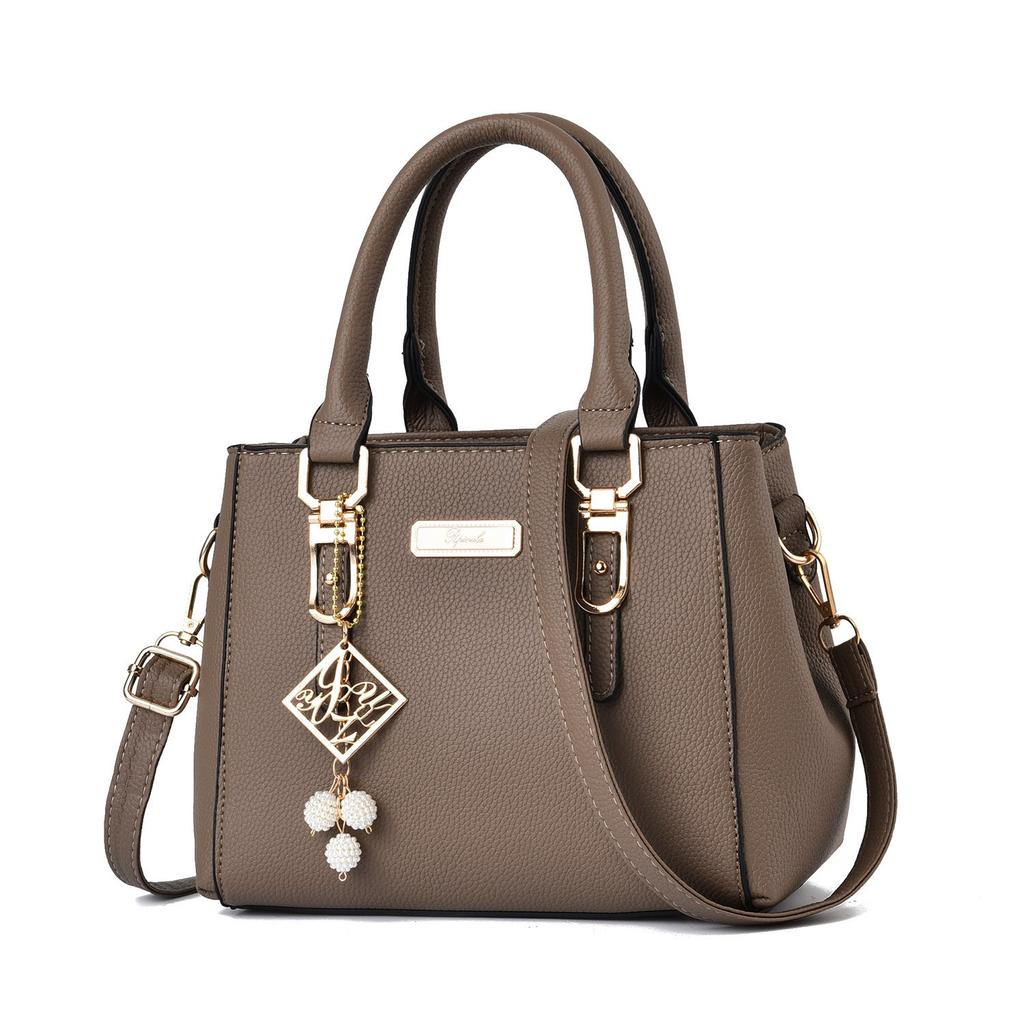 Fashion versatile women's handbag simple large-capacity messenger bag double-layer hairball shoulder bag bags