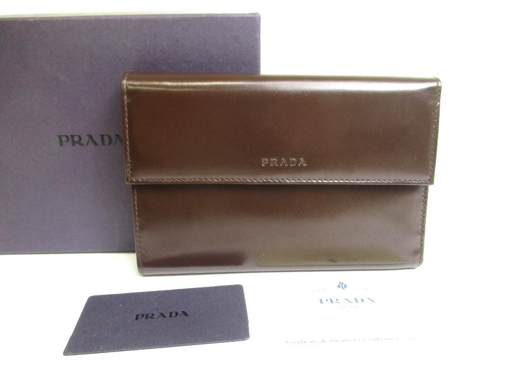 

Authentic PRADA Dark Brown Leather Trifold Wallet Compact Wallet #a582 Refurbished