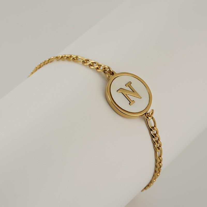 Pulsera Redonda de Acero Inoxidable 18K Europea con Letra para Mujer - Joyería de Mano Moderna y Elegante