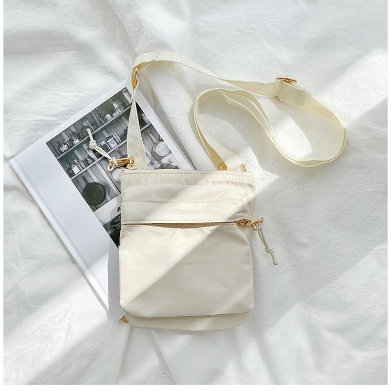 

Mini bag messenger bag women s simple nylon change mobile phone bag women s high-end versatile single shoulder small square bag women абрикосовий