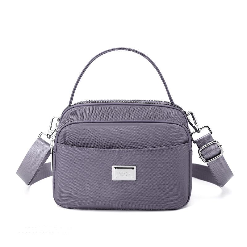 Bolsa feminina de tendência de rua portátil de um ombro crossbody bolsa de mãe feminina da moda