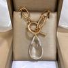 Elegant Retro Button Pendant Transparent Teardrop Shaped Pendant Necklace Suitable for Women's Daily Life and Parties