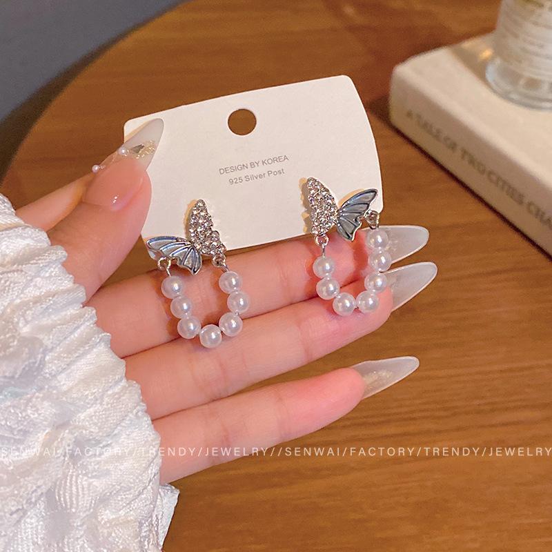 Diamond-set blue butterfly pearl earrings women s light luxury high-end sweet stud earrings design unique ear jewelry