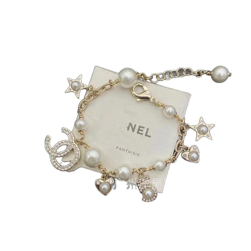 Seiko Elegantes Doppel C Perlen- & Diamant-Sternenherz-Armband für Damen