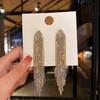 Silver Needle Diamond Water Drop Tassel Earrings - Elegant Court Style, Versatile & Luxurious Design.