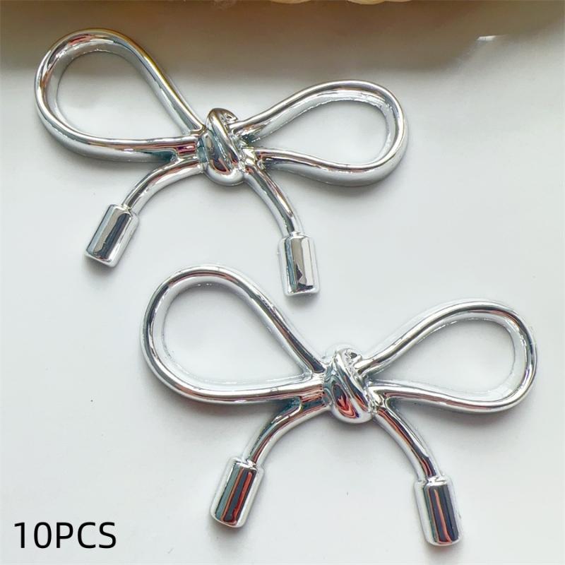 10/18Pcs Diy Hole Shoes Charms Electroplated Silver Bow Tie Accessories Designer Garden Shoe Decoration Girl Gift