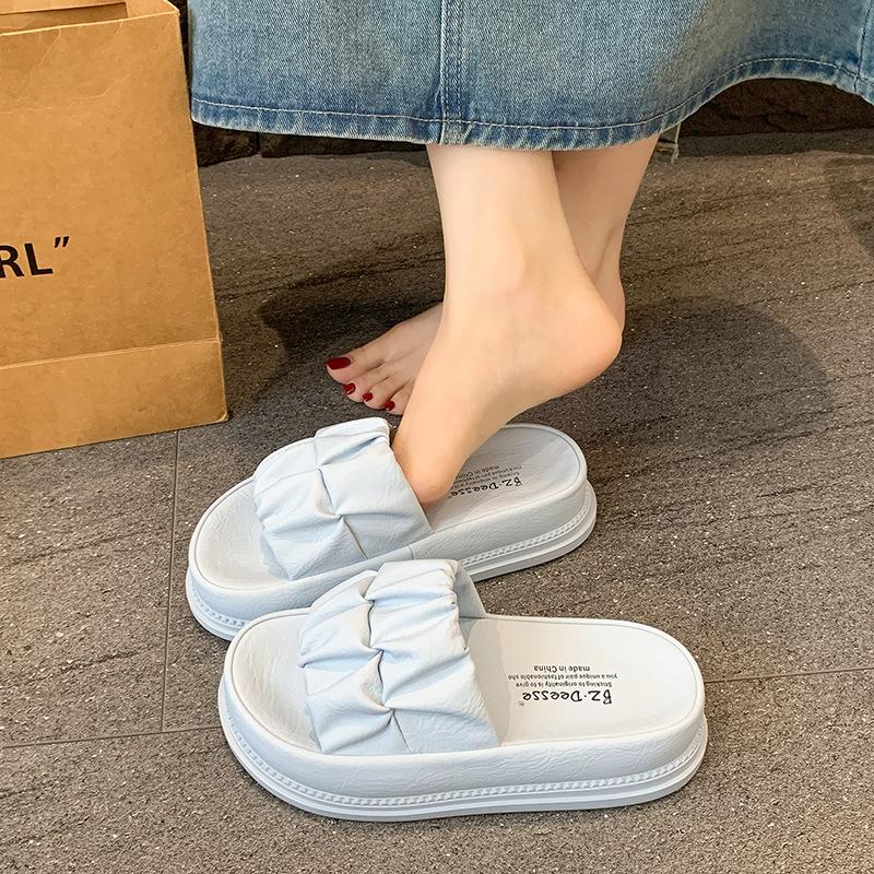 Thick-soled slippers for women's outer wear 2025 summer new non-slip heightening fashionable muffin one-word slippers