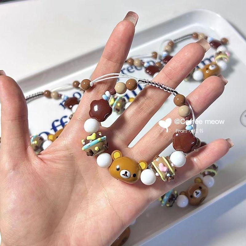 

Сосновый медведь Маленький белый медведь Брат Большая голова Древний и ранний вкус Оригинальный браслет из бисера ручной работы Румяна Милый плетеный ремешок для переноски Kongsong Bear Woven Bracelet (1)