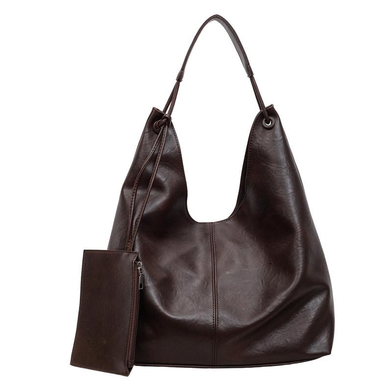 Large Capacity Tote Bag Women's 2026 Spring New Fashion Retro Sense Light Luxury Shoulder Armpit Bag