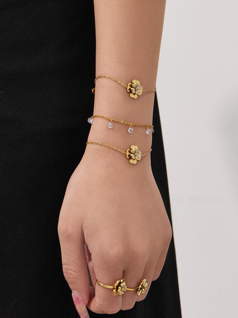 European & American Light Luxury Clover Jewelry Set: Stainless Steel, Zirconia-Embedded, Versatile Necklace, Bracelet, Ring & Earrings for Women.