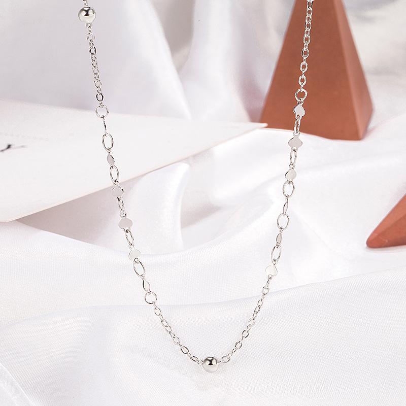 Collana clavicola con cuore di paillettes e perline: Lusso Leggero, Stile Estivo Fresco, Design di Alta Gamma