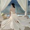 Sexy white suspender neck dress female summer temperament high sense seaside vacation halter fairy long skirt