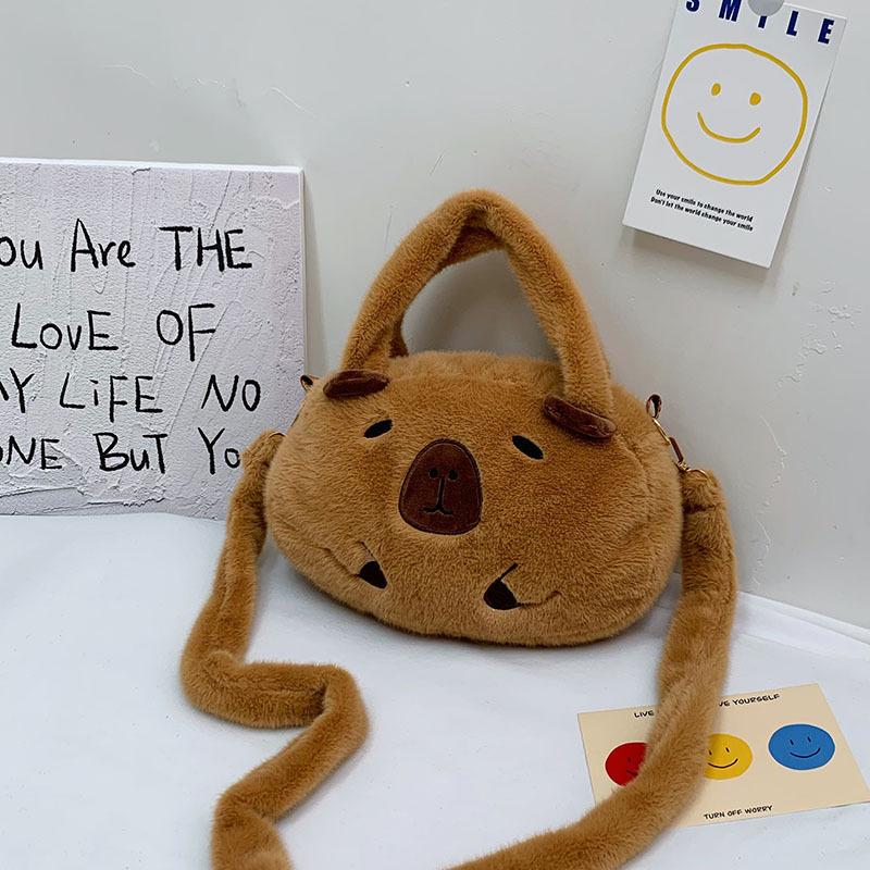 

Новый плюшевый рюкзак Капибара Капибара, симпатичная универсальная сумка для волос, женская сумка через плечо с мультяшным принтом One size
