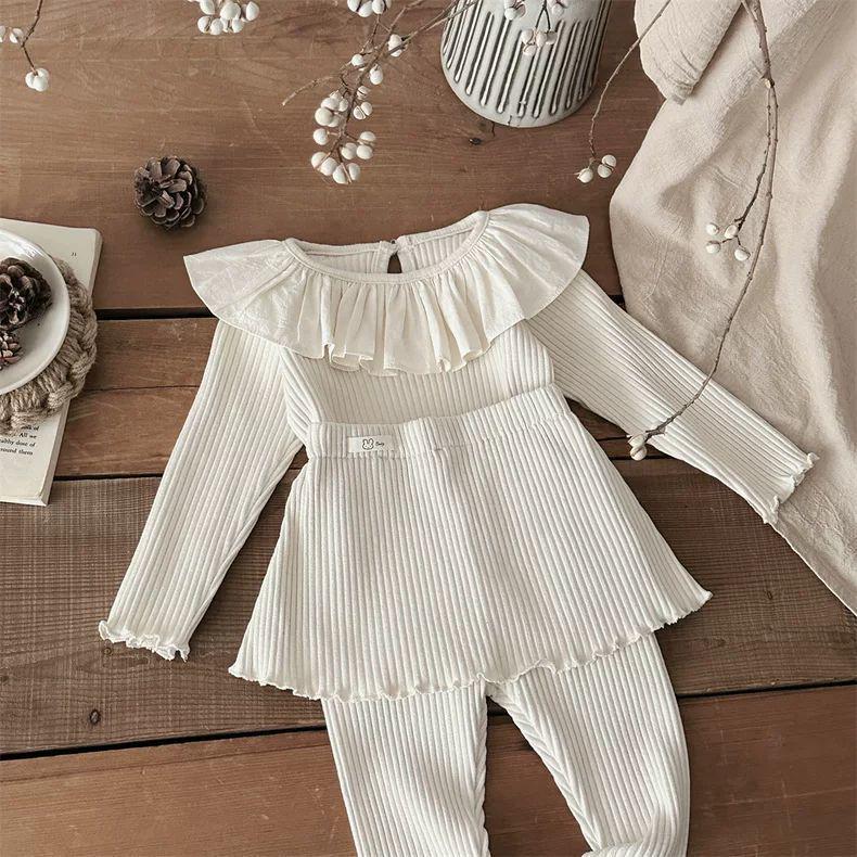 

Комплект для младенцев и малышей: топ с длинным рукавом и ребристым воротником-рюшем + юбка-брюки для девочек Customizable (up to 1000 pieces)