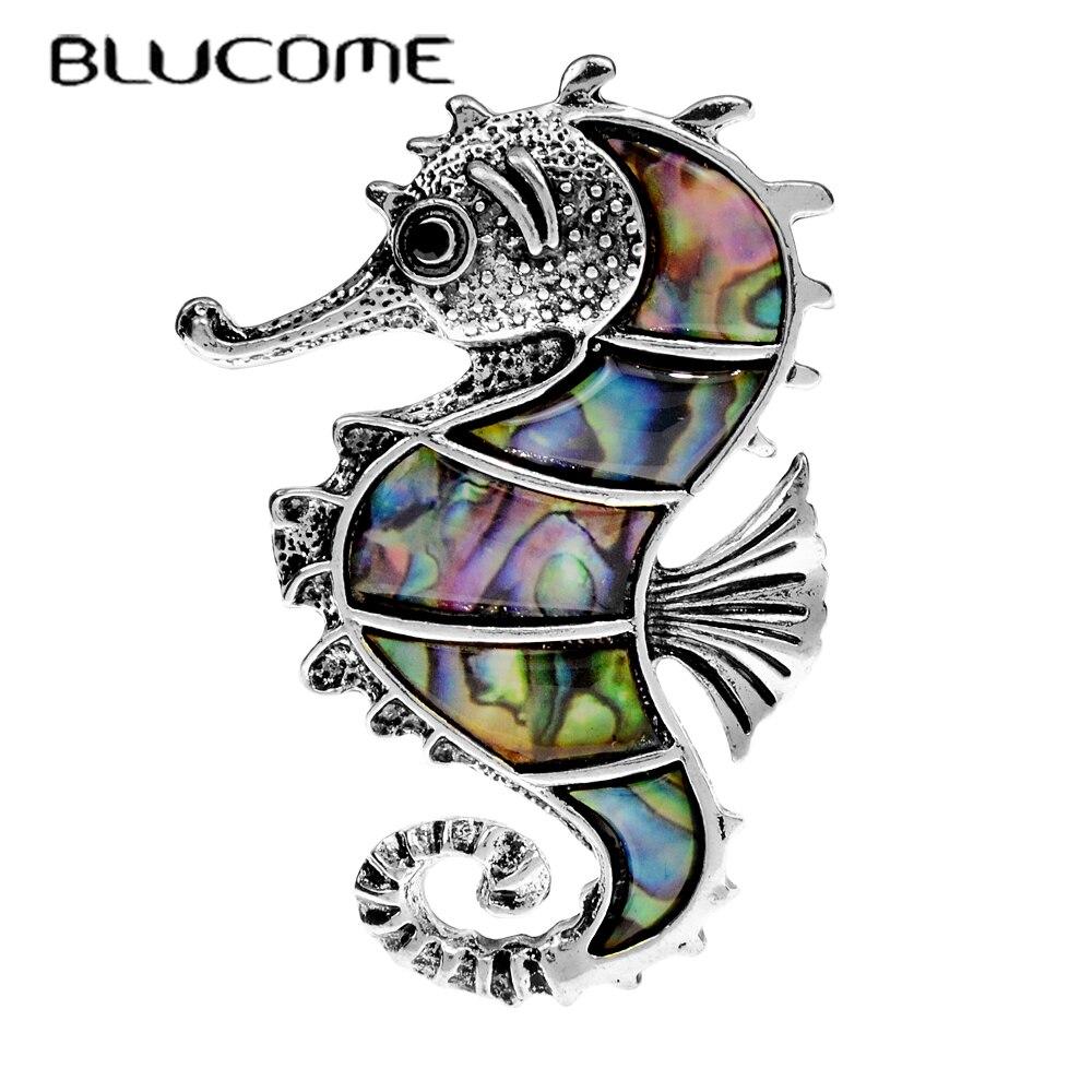 

Blucome Винтажные броши морского конька для женщин Материал раковины Гиппокамп Булавка Модные ретро-аксессуары