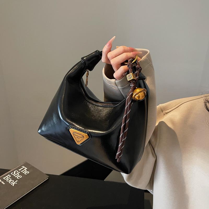 High-end niche bag women's spring retro new fashion messenger bag women's portable work dumpling bag