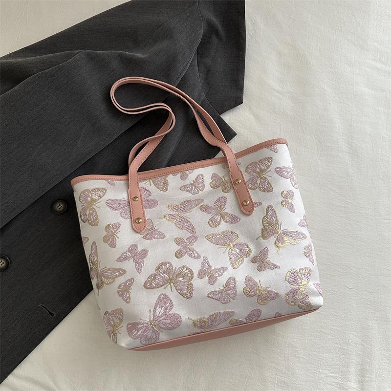 

Повседневная большая вместительная новая китайская сумка женская 2025 новая универсальная сумка через плечо в иностранном стиле студенческая сумка-тоут розовый