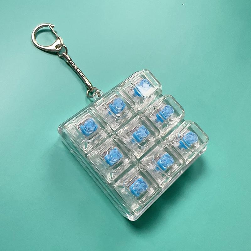 Tastiera a 9 Tasti Keycaps Portachiavi Giocattolo Fidget Keycaps Anti-Ansia Keycaps Festa Sollievo dallo Stress Keycaps Fai-da-Te Tappi Tastiera Giocattolo