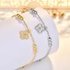 Real Gold Electroplated Four Leaf Clover Flower Bracelet with Adjustable Buckle Design for Women, Zircon Hand Decoration, Light Luxury Accessory