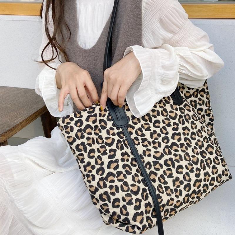 01 New Canvas Bag Large Capacity Black and White Leopard Print Bag Bell Dog Armpit Bag Portable Tote Bag