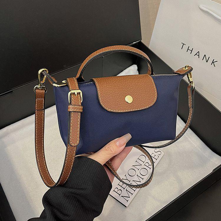 Elegant Lightweight Crossbody Handbag: Versatile Women's Commuter Bag with Phone and Coin Pockets