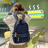 Schoolbag Korean version ins Large capacity solid color campus simple and lightweight versatile letter schoolbag 3rd to 6th grade students shoulder