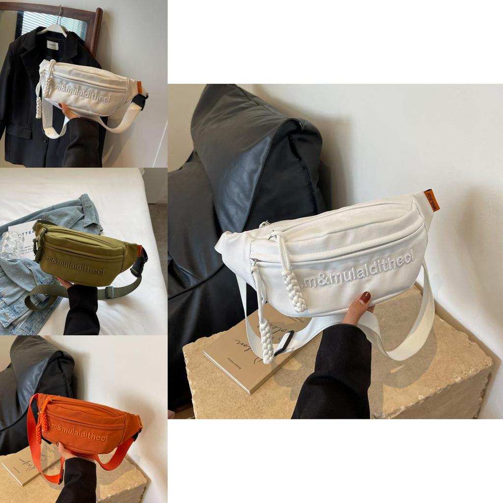 Versatile Water-resistant Canvas Crossbody Bag With Letter Print Perfect For Travel And Casual Use