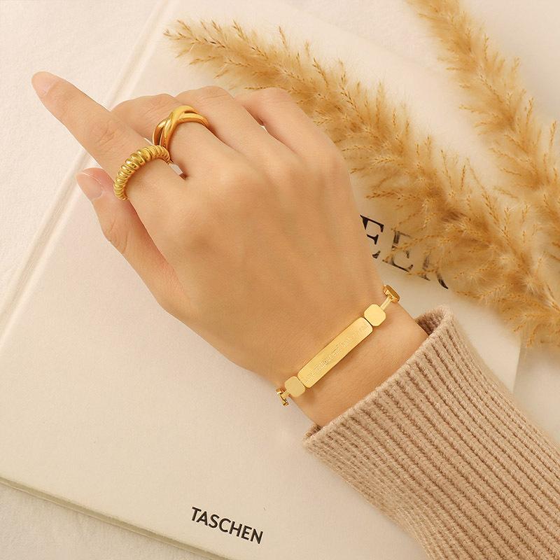 

Niche stylesense of design english lettering bracelet new arrival titanium steel plated 18k gold jewelry