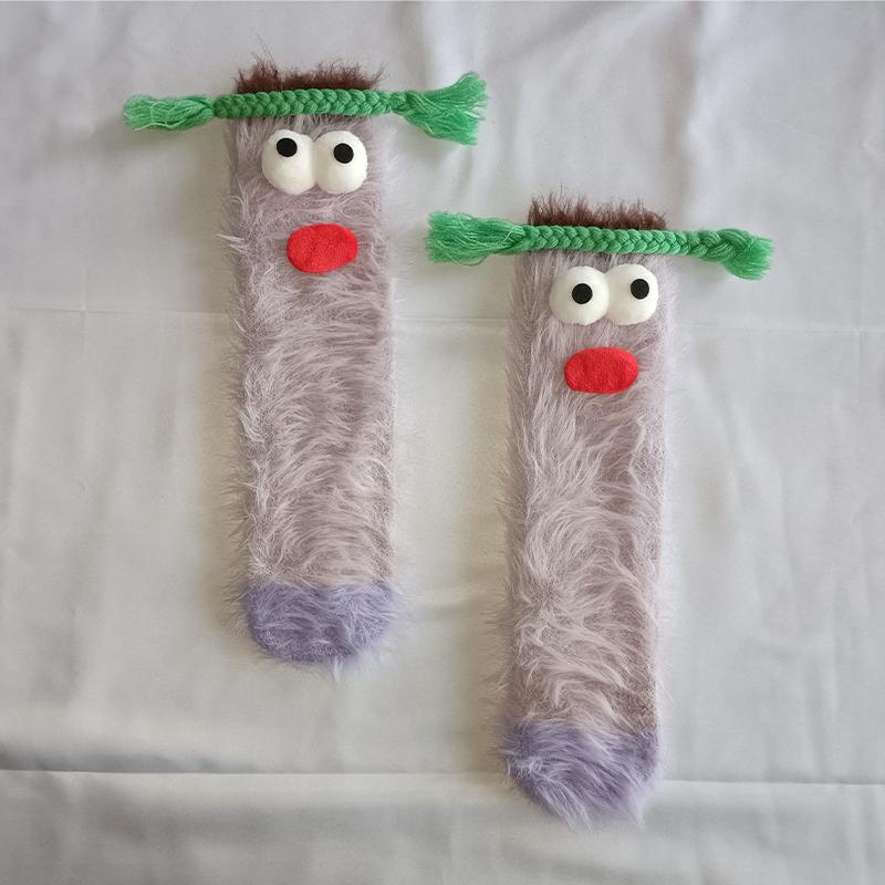 A pair of ugly cute funny socks women's medium tube socks autumn and winter floor sleeping socks coral fleece home hair fluffy c