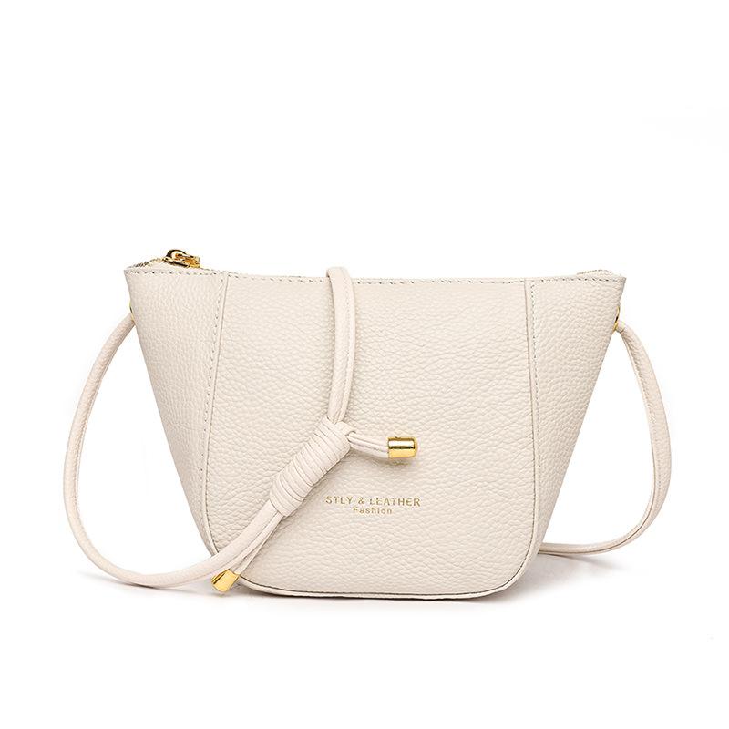 First layer cowhide women's bag, genuine leather lychee pattern bucket bag, underarm bag, large capacity shoulder messenger bag.