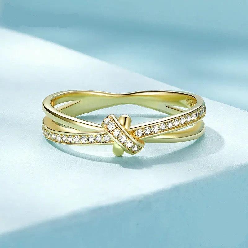 Elegant European & American Style S925 Sterling Silver Knot Ring with Micro-paved Zircon - Simple, High-end Fashion for Women.