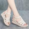 Hollow breathable sandals women's summer new slope heel platform casual versatile medium shoes women's shoes