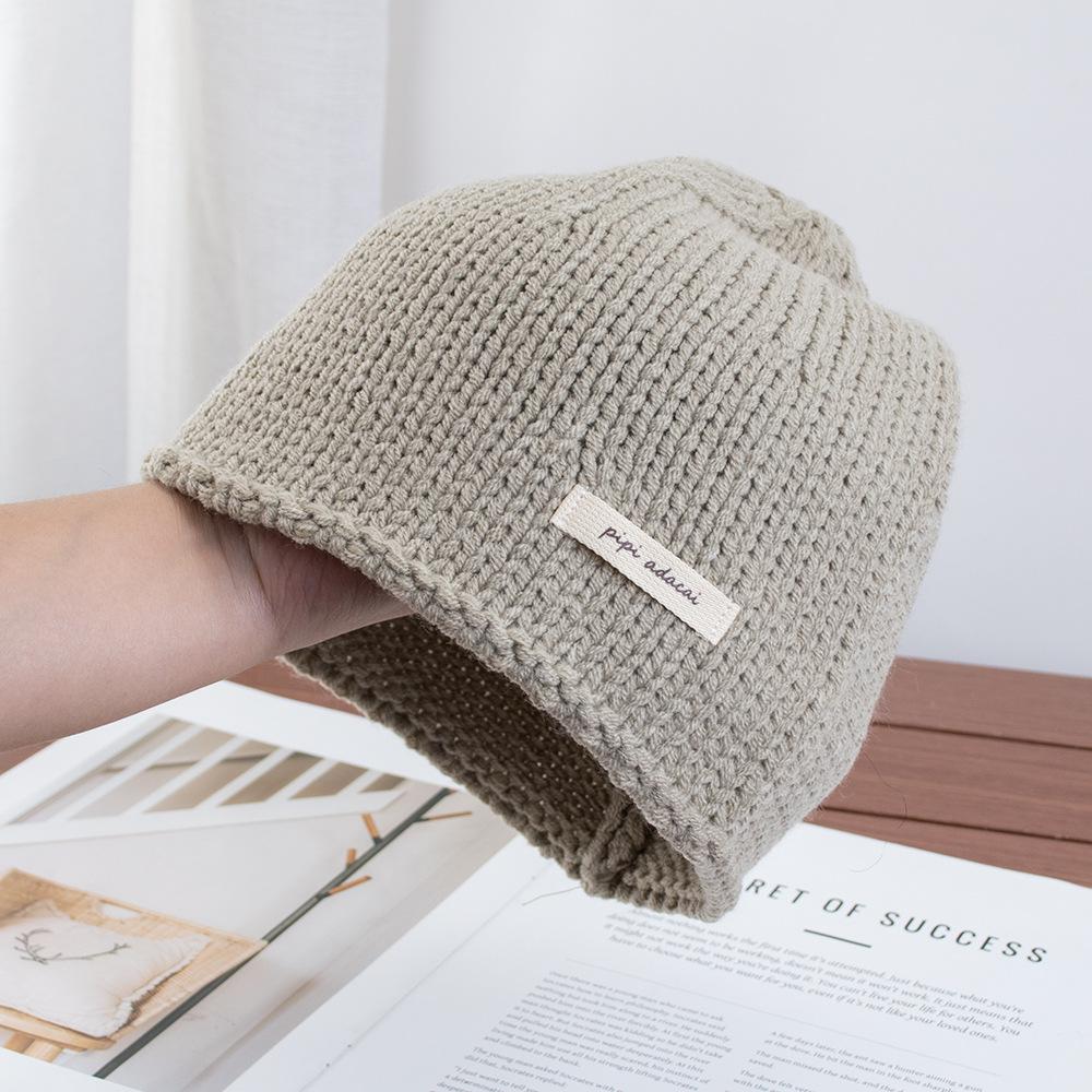 Simple solid color knitted bag head stacking hat women's early autumn new plain and versatile big head circumference showing face small wool hat