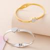 Heart-shaped Zirconia Inlaid Titanium Steel Bracelet for Women - Open Spring European Style.