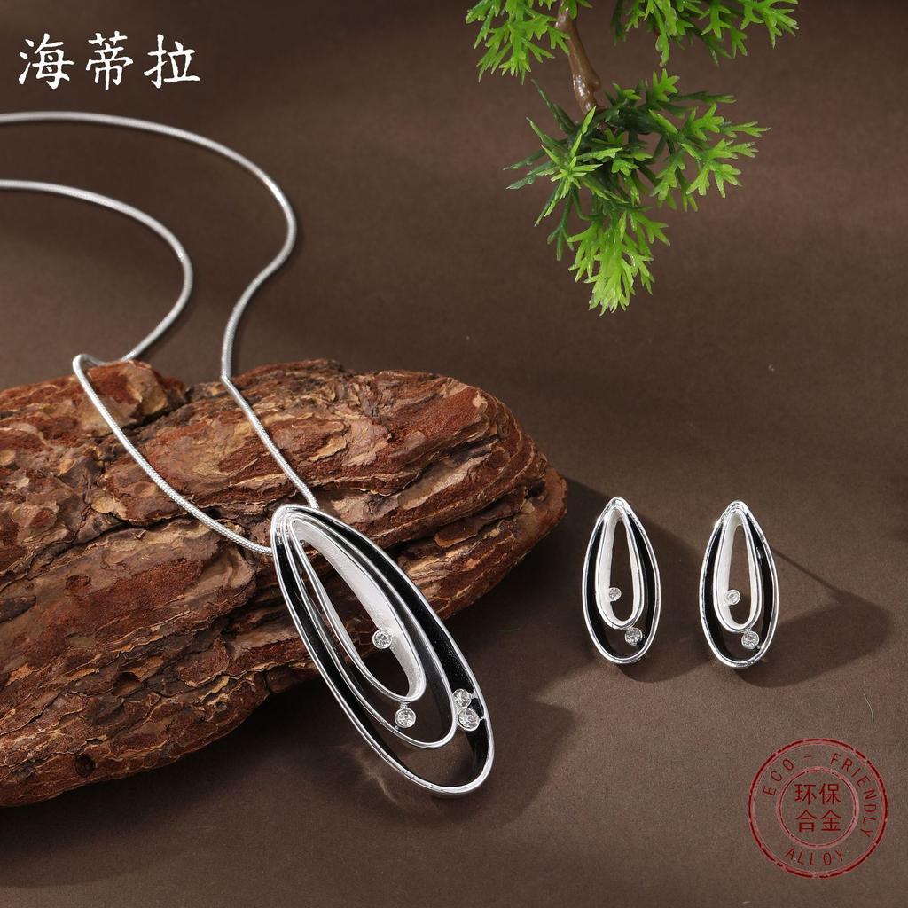 New enamel color hollow oval stud earrings pendant set women's fashion simple point diamond oval neck necklace