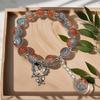 Braccialetto in Vetro Fiore Esplosione Fantasy da 10 mm: Ciondolo Farfalla Colore Degradé Design di Nicchia per Donne e Migliori Amiche.