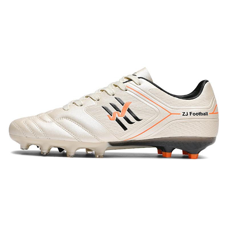 New football shoes new men's and women's low-top spikes fashion grass non-slip teenagers