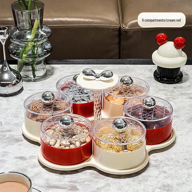 Luxuriöse Obst- und Süßigkeitenschale: Festliche Aufbewahrung für Snacks auf dem Couchtisch.