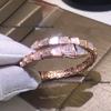Seiko 18K Gold & Diamond Snake Bracelet: Women's 925 Sterling Silver, Double Circle, Mother-of-Pearl Inlay.