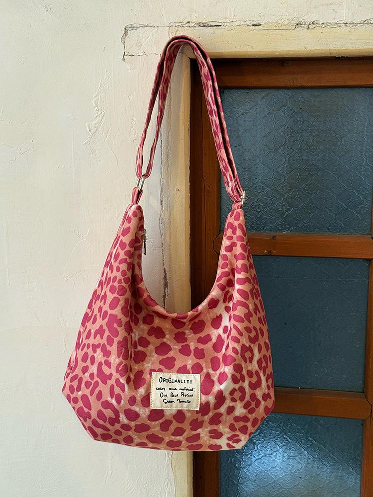 

2025 новая модная холщовая сумка с леопардовым принтом в стиле ретро, большая вместимость, полосатая на плечо, сумка-мессенджер, нишевая сумка-тоут для通勤