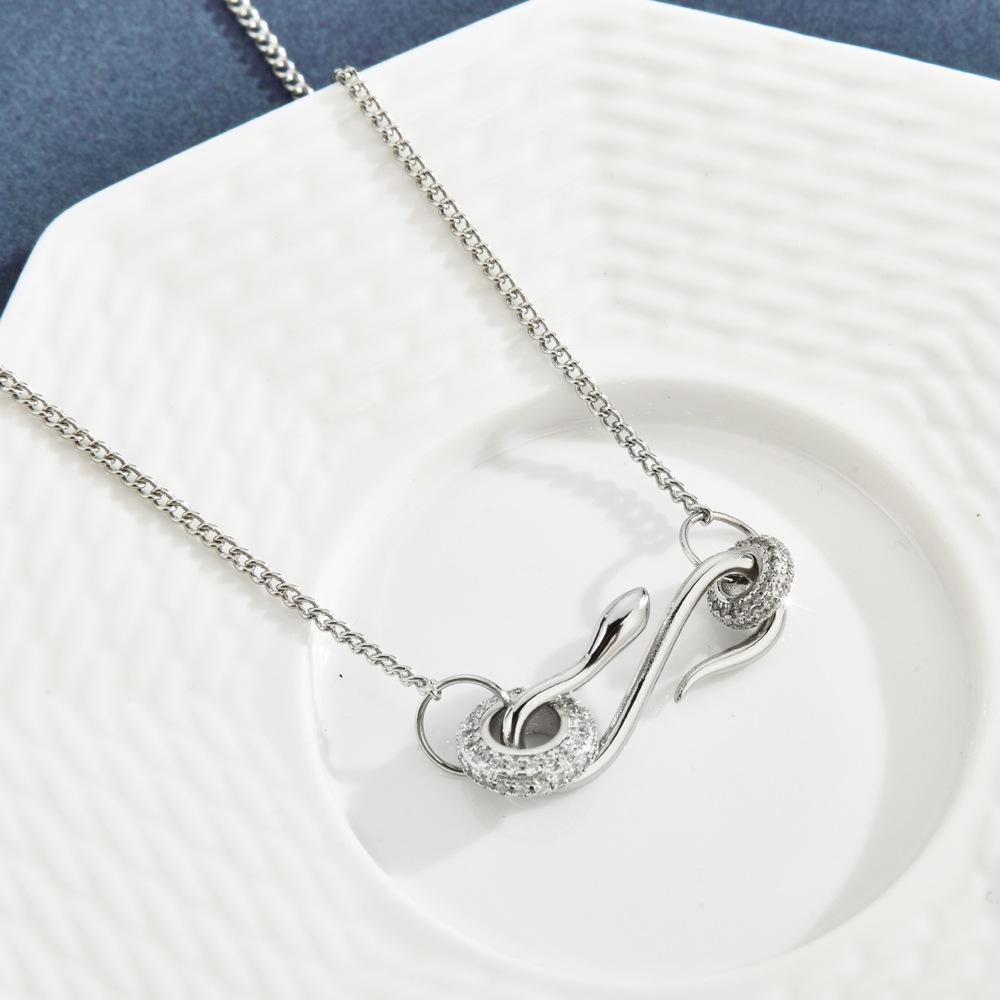 

Привлекательное ожерелье-чокер в виде змеи для женщин в стильной золотой и серебряной отделке серебряный