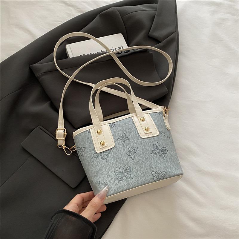 

Niche fashion portable small bag women s new high-end texture messenger bag casual versatile bucket bag