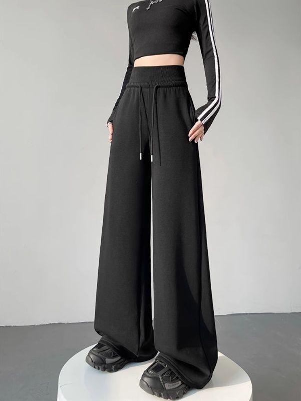 Wygodne i stylowe szare spodnie damskie w amerykańskim stylu ze sznurkiem i szerokimi nogawkami, idealne do noszenia na co dzień i do uprawiania sportu