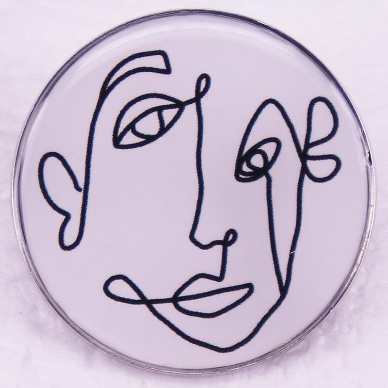 Брошь с абстрактным изображением лица серебряный