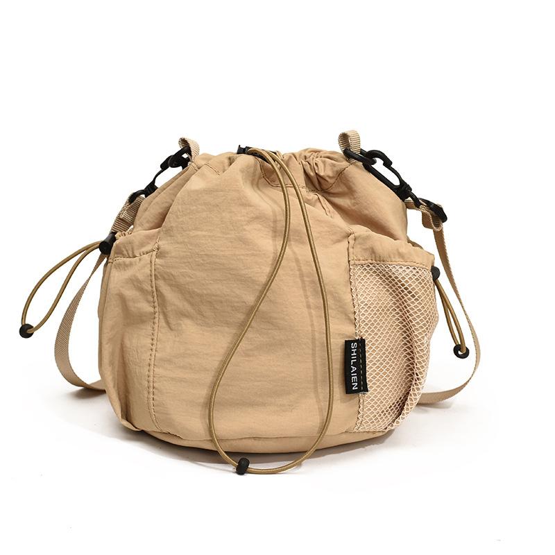 Trendy New Fashion Ins Casual Simple and Lightweight Drawstring Bucket Bag Commuting Versatile Sports Travel Messenger Bag