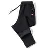 Men's Plus Size Fleece-Lined Winter Sports Sweatpants with Zip Pockets