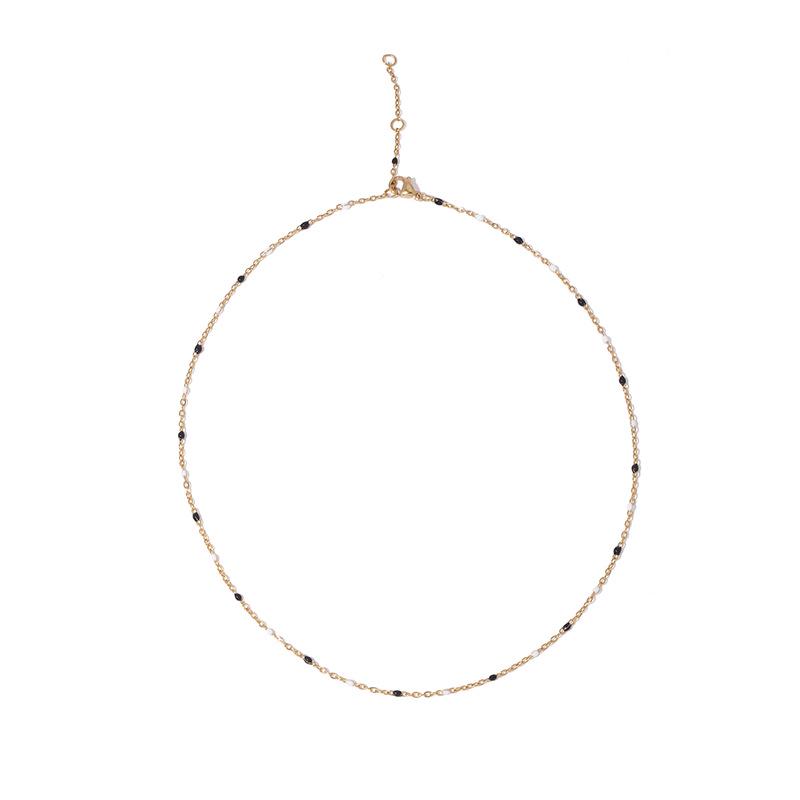 

Черно-белое эпоксидное титановое стальное ожерелье: Корейский дизайн одежды для женщин, стильные тонкие цепочки