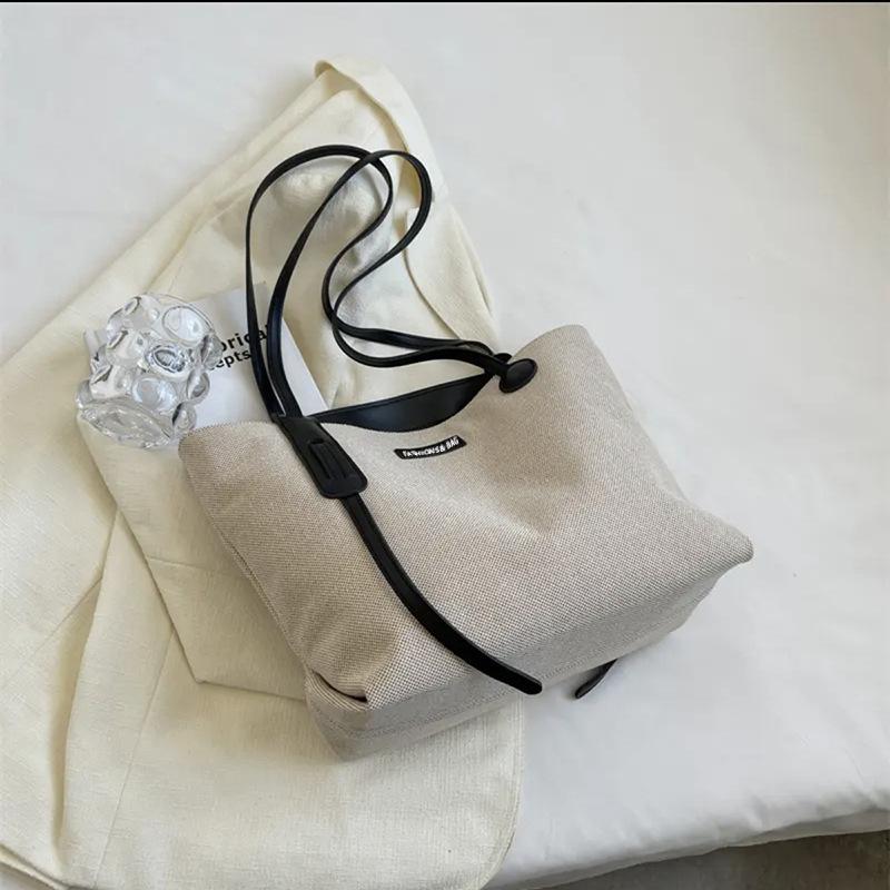Casual large-capacity bag women's bag 2025 spring/summer new versatile canvas bag commuter shoulder bag simple tote bag