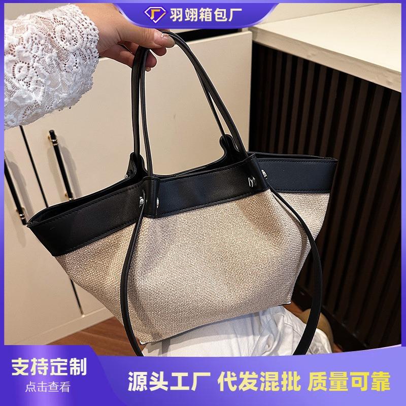 Spring new retro portable shoulder bag niche design canvas splicing large capacity tote bag