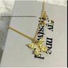 Empress Dowager Butterfly Zircon Jewelry Set: Rhinestone Necklace, Bracelet, Earrings with Asymmetric Saturn Design